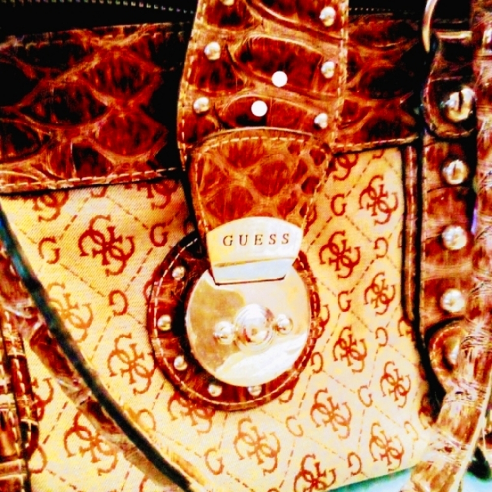 Rare vintage authentic cloth Guess shoulder bag. Good condition inside and out.